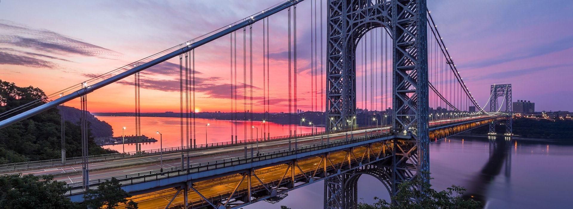 George Washington Bridge photo at sunset. The George Washington Bridge is located in Bergen County, New Jersey